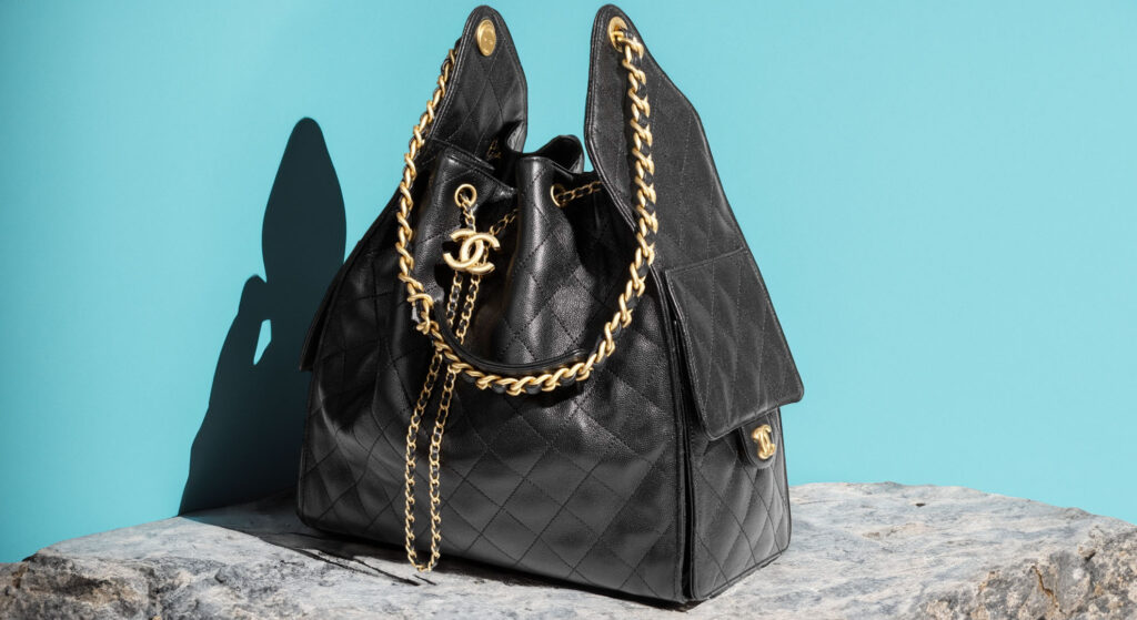 Dua Lipa and the CHANEL 25 Handbag: A Moving Portrait of Urban Elegance
